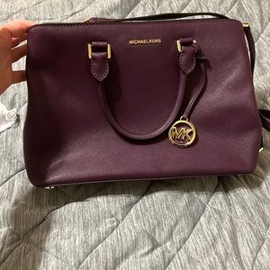 Plum colored, Michael Kors purse.